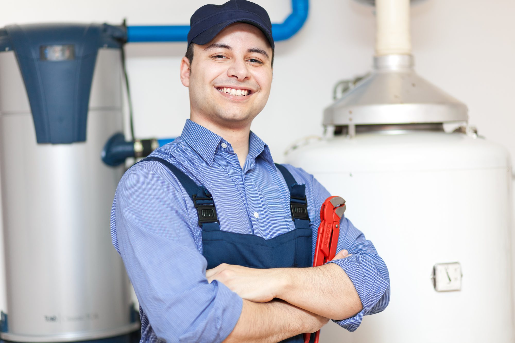 Plumber Repairing An Hot-Water Heater